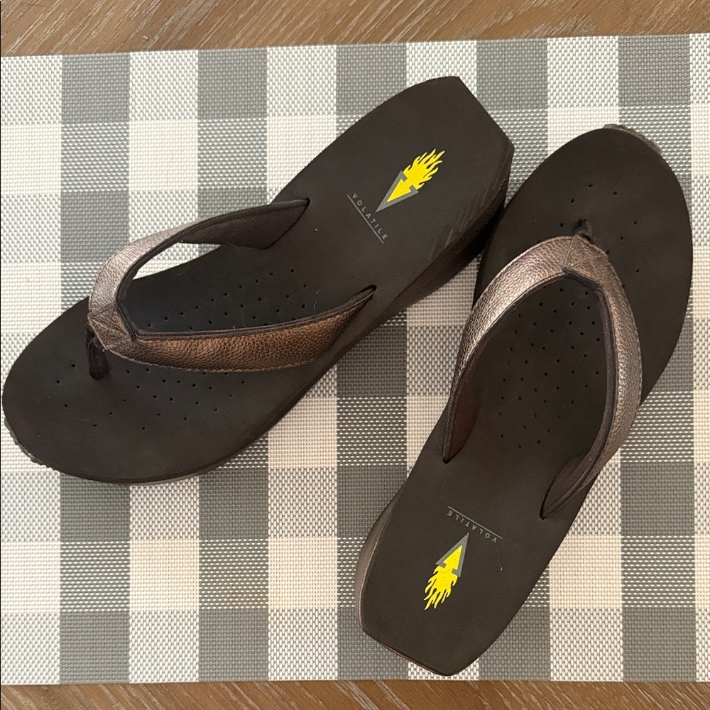 Volatile Black and Bronze Sandals